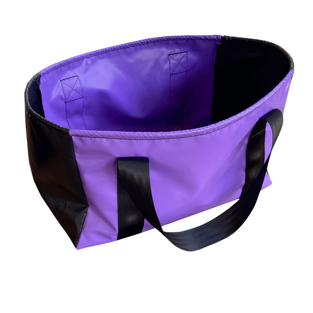 Large durable shopping bag with reinforced stitching and seatbelt webbing handles, ideal for retail, groceries, or everyday carrying.