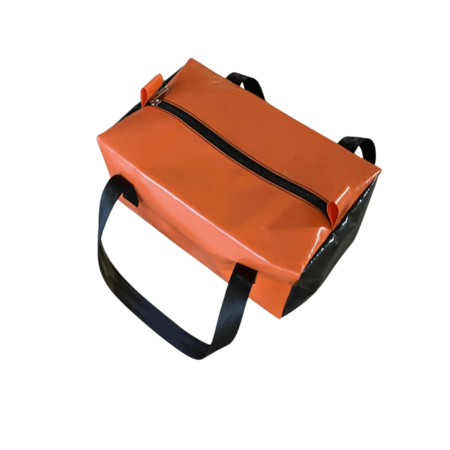 Dust & Iron camping toiletry bag made from PVC with sturdy zipper and handles – rugged storage for toiletries on camping trips.