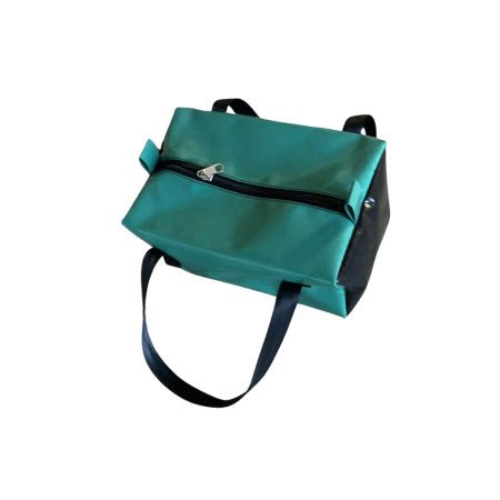 Lifestyle photo of Dust & Iron camping toiletry bag – rugged PVC design for toiletries and grooming products in outdoor and caravan settings.