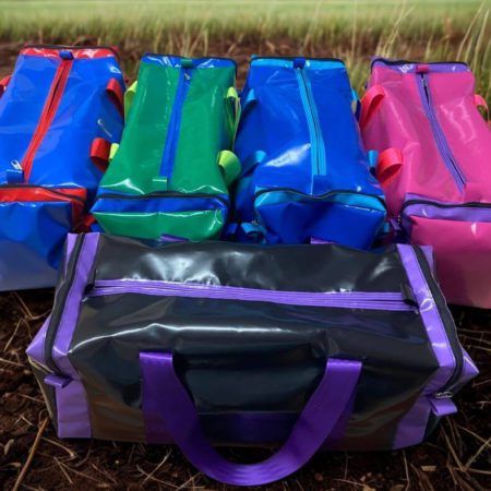 “Medium gear bag with end pockets – durable travel and sports bag with reinforced handles”