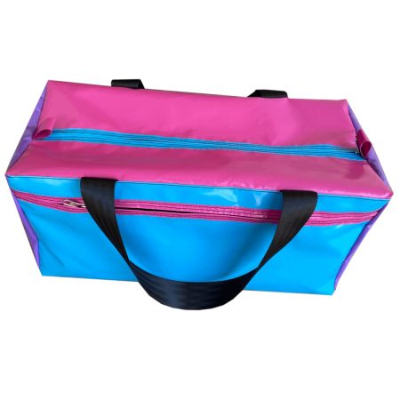 Small Pink PVC vinyl gear bag with side pocket, reinforced handles, and heavy-duty zip, ideal for travel, camping, or sports gear storage.