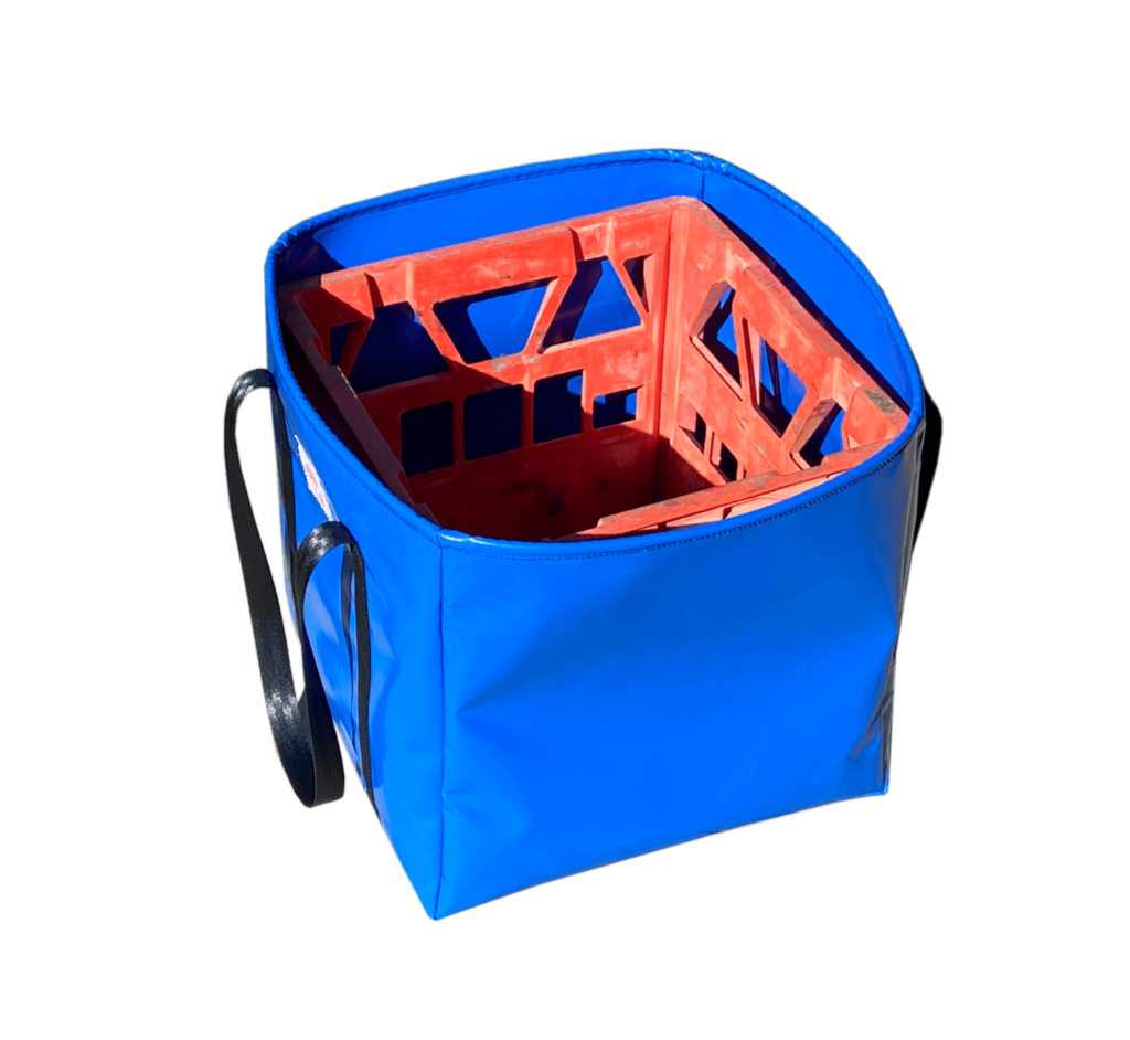 Stylish blue gear bag with black straps, tough PVC construction, perfect for camping, sports, or weekend trips.