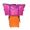 Durable PVC pillow carry bag, lightweight and stylish, designed to hang over luggage handles for easy travel.Pink and purple pillow carry bag.