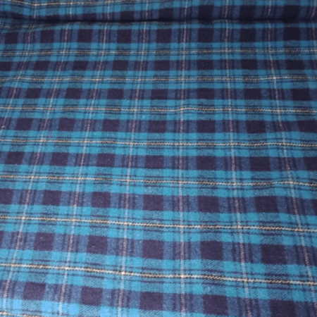 “Light blue and yellow wool lining inside saddle gear bag – eco-friendly recycled wool fabric”