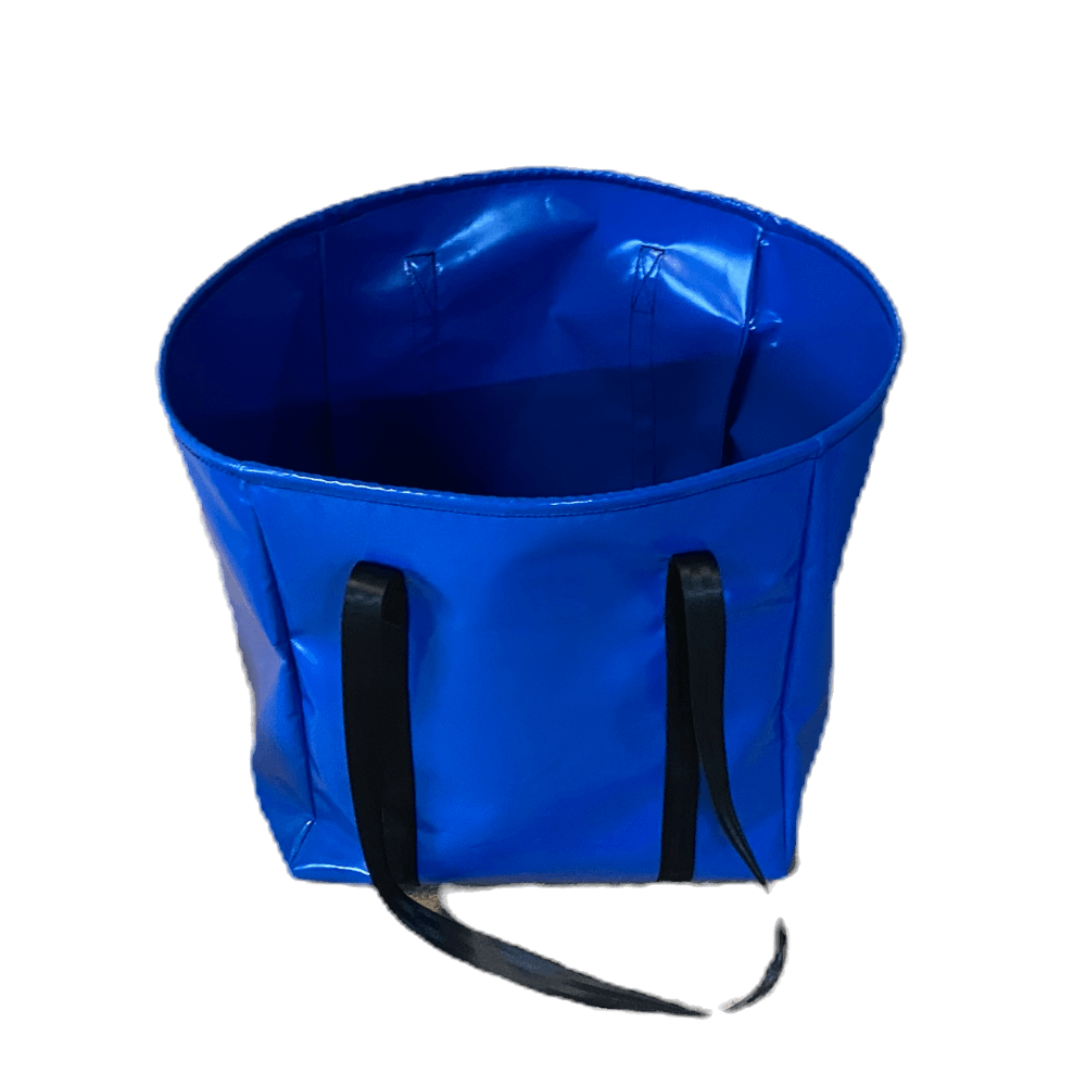 Reusable PVC tote bag with black seatbelt webbing handles, compact and lightweight.