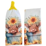 Highland cow sunflower hand towel set with hanging crochet top towel and matching printed towel.