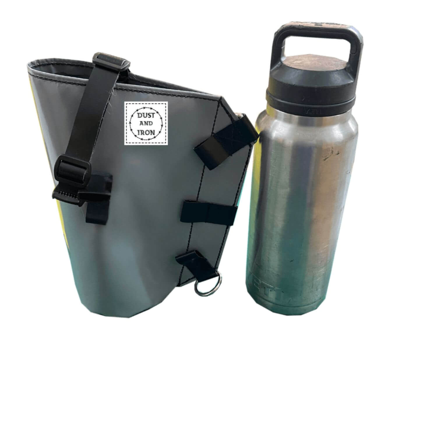 Grey PVC Yeti water bottle carry bag with black buckles and a sturdy strap, shown beside a stainless-steel water bottle on a white background.
