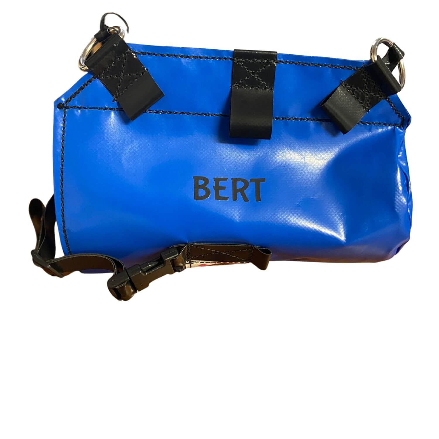 Blue PVC water bottle holder with black straps, metal D-rings and the name “BERT” printed on the front, lying flat on a white background.